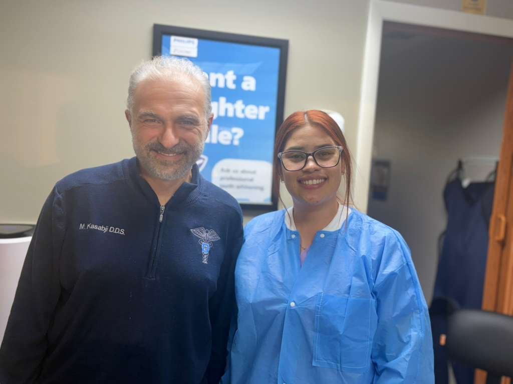 Dr. Maher Kasabji DDS with dental assistant