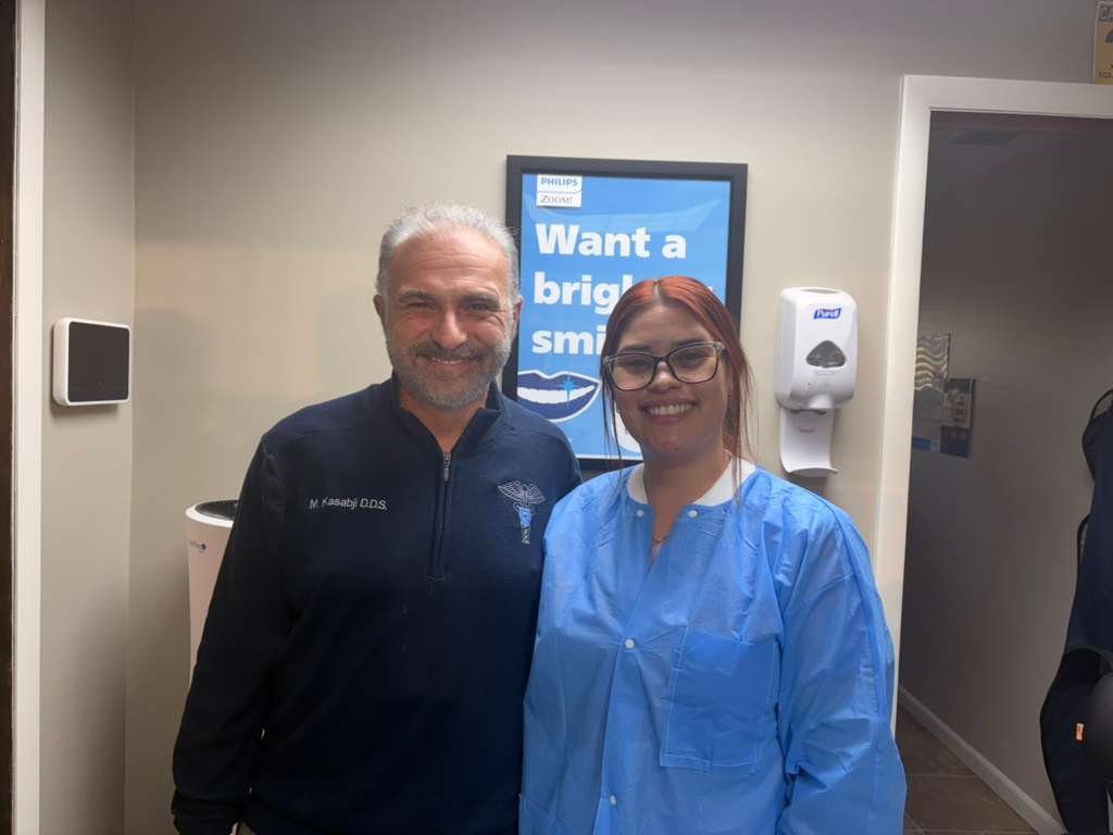 Dr. Kasabji with staff member